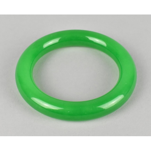 432 - A Apple Jade Effect Bangle, 9cm Diameter