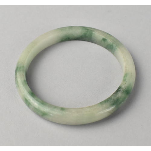 438 - A Moss Jade Effect Bangle, 7cm Diameter