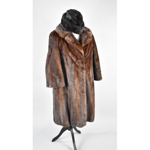 473 - A Vintage Marshall and Snelgrove Ladies Fur Coat an a Faux Fur Hat, Size L