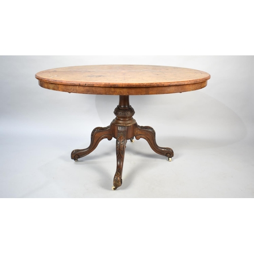 476 - A Victorian Inlaid Burr Walnut Oval Snap Top Breakfast Table on Quadrant Base, 121cms by 87cms