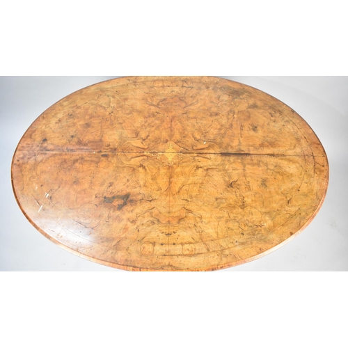 476 - A Victorian Inlaid Burr Walnut Oval Snap Top Breakfast Table on Quadrant Base, 121cms by 87cms