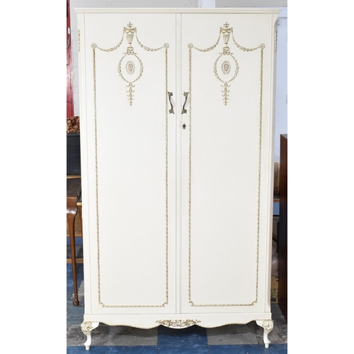 498 - A Cream and Gilt Fitted Gentlemans Wardrobe, 110cms Wide