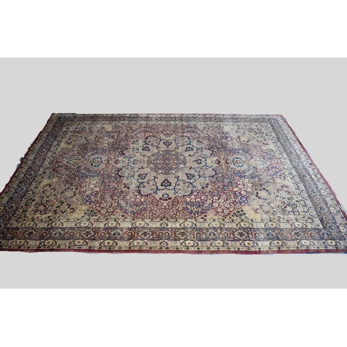 500 - A Large Patterned Woollen Rug, 460x314cms