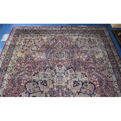 500 - A Large Patterned Woollen Rug, 460x314cms