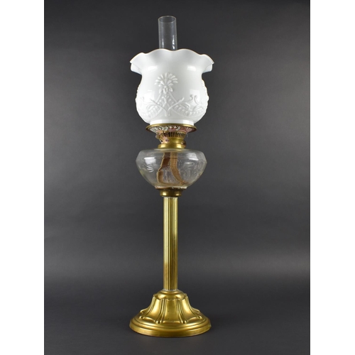 57 - A Late Victorian Brass Based Oil Lamp, Support in the Form of a Reeded Column with Clear Glass Reser... 