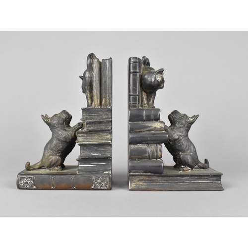 62 - A Pair of Japanese Spelter Novelty Bookends in the From of Dog Chasing Cat Stood on Book, 15cms High