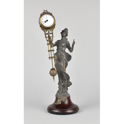 80 - A Reproduction Bronze Figural Mystery Clock in the Form of Art Nouveau Style Maiden, 33.5cms High