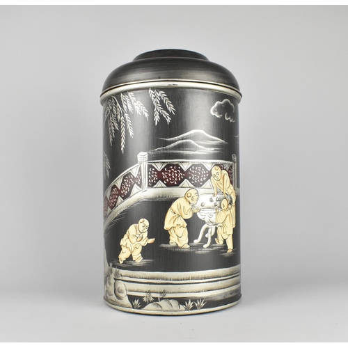 82 - A Reproduction Chinoiserie Decorated Toleware Tea Caddy, 37cms High