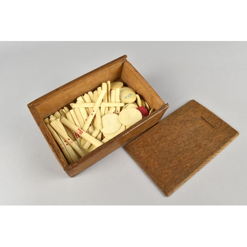 106 - A Vintage Wooden box with Sliding Lid Containing Chinese Bone Gaming Counters, Mahjong Counters Etc