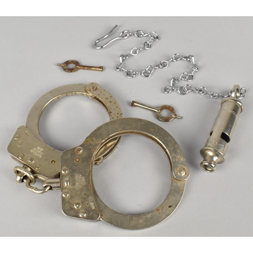 110 - A Pair of Hiatt Police Handcuffs with Key and a Vintage Metropolitan Police Whistle