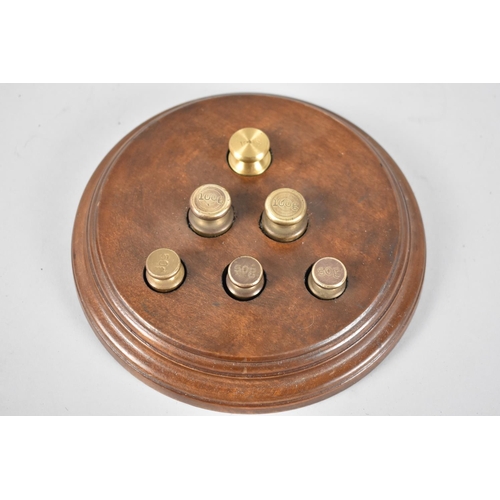 111 - A Mid 20th Century Set of Travelling Metric Weights Mounted on Circular Wooden Plinth, 18cms Diamete... 