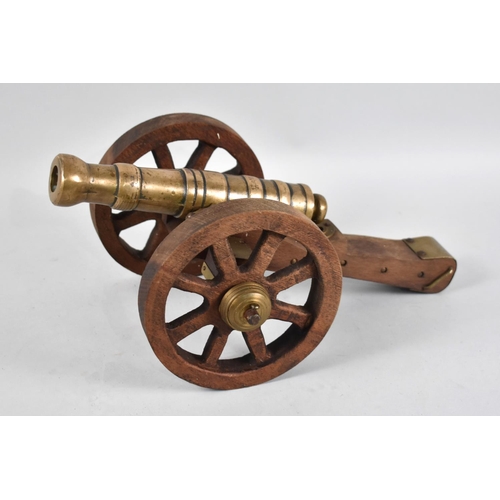 13 - A 20th Century Bronze and Wooden Model of a Spanish Cannon, 36cms Long