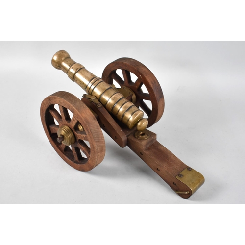 13 - A 20th Century Bronze and Wooden Model of a Spanish Cannon, 36cms Long