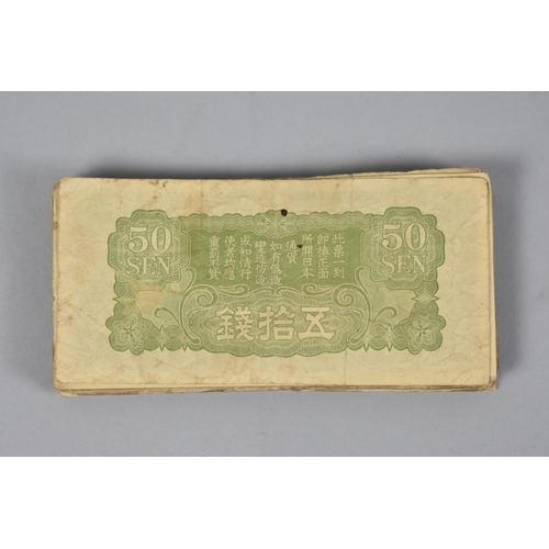 A Collection of Rare WW2 (1940) Japanese 50 Sen Military Issue Bank Notes