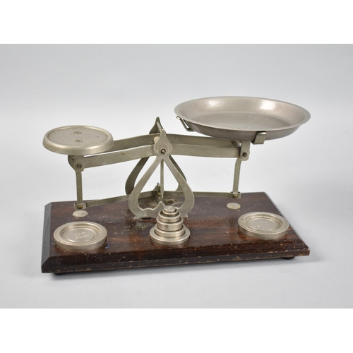 42 - A Set of Edwardian Postage Scales and Weights on Wooden Plinth, 21cms Wide