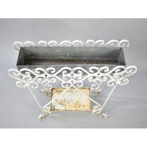 482 - A White Painted Wrought Iron Plant Stand with Stretcher Shelf, 73x68cm high