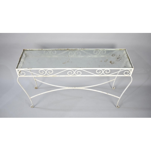 483 - A White Painted Wrought Iron Rectangular Conservatory Side Table with Glass Top, 107x61cm high