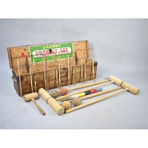 497 - A Jaques Croquet Set in Box to comprise Four Mallets, Balls, Hoops Etc, 110cms Wide