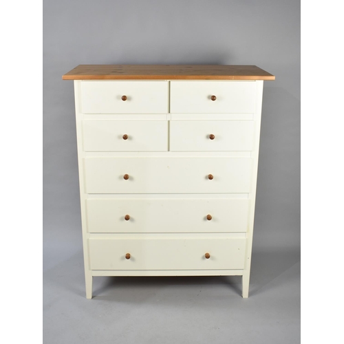 516 - A Modern Cream Pine Effect Bedroom Chest of Four Short and Three Long Drawers, 101cms Wide and 124cm... 