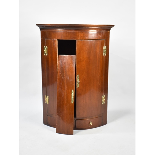 519 - A Reproduction Mahogany Bow Fronted Corner Cabinet, One Door Requires Repair, 63cms Wide