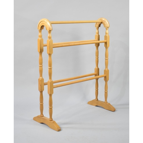 521 - A Reproduction Victorian Style Satinwood Towel Rail, 62cms Wide