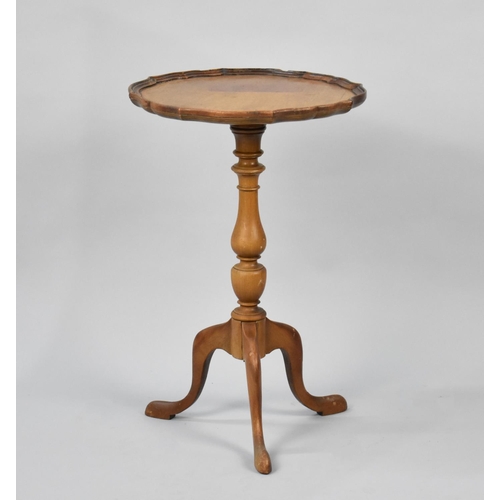 523 - A Reproduction Tripod Wine Table with Piecrust Edge, 34cms Diameter