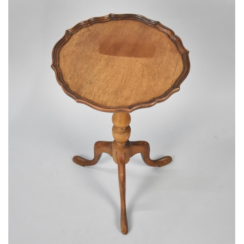 523 - A Reproduction Tripod Wine Table with Piecrust Edge, 34cms Diameter