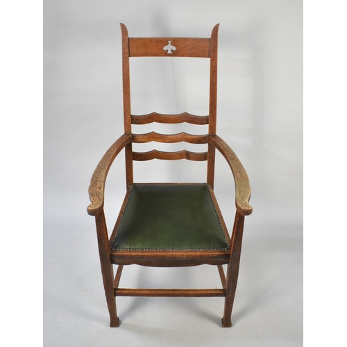 530 - An Arts and Crafts Oak Framed Gents Armchair with Brass Studded Hide Seat