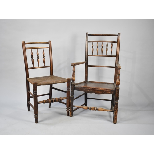 531 - A 19th Century Spindle Back Elm Seated Ash Framed Armchair together with a Rush Seated Spindle Back ... 