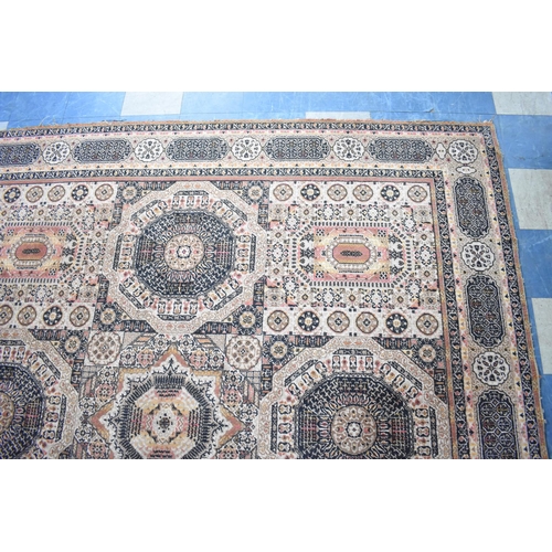 543 - A Patterned Rug, 275x270cms