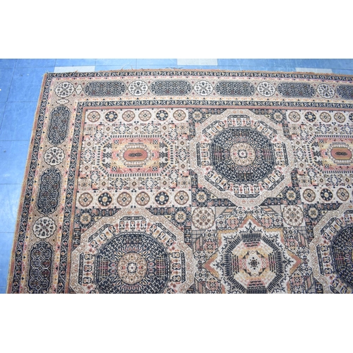 543 - A Patterned Rug, 275x270cms