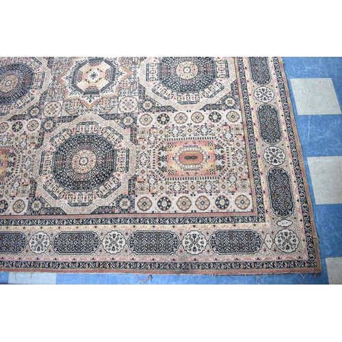 543 - A Patterned Rug, 275x270cms