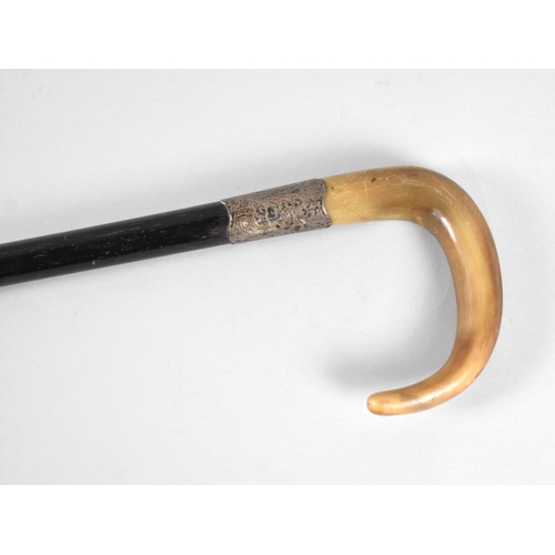 63 - A Horn Handled Walking Stick with Engraved White Metal Collar