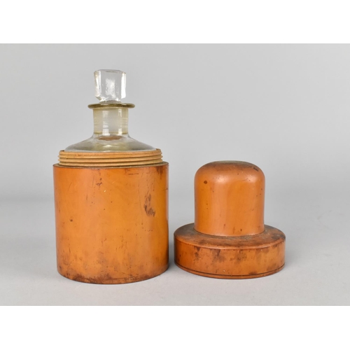 69 - A Circular Treen Case with Screw Off Top Containing Glass Bottle with Stopper, 14cms High