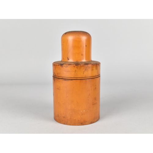 69 - A Circular Treen Case with Screw Off Top Containing Glass Bottle with Stopper, 14cms High