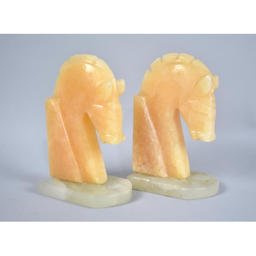 70 - A Pair of Carved Onyx Horse Head Bookends, 14cm High