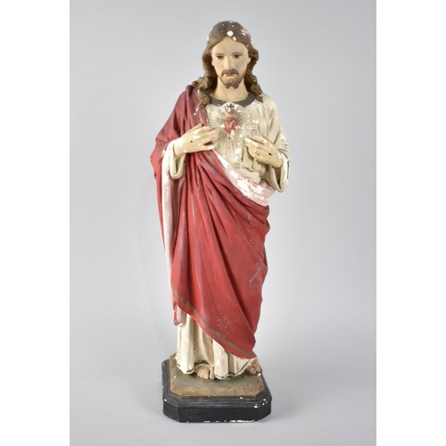 72 - A Mid 20th Century Altar Figure of Jesus in Cold Painted Plaster, Inscribed to Base 41cms High