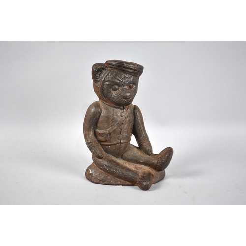 82 - A Mid 20th Century Cast Iron Novelty Doorstop in the Form of a Seated Teddy Bear, 19cms High