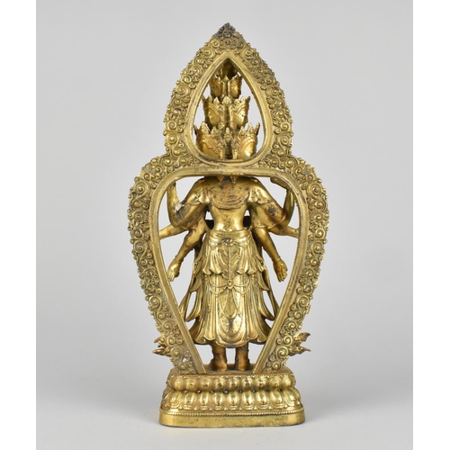 66 - A Gilt Bronze Study of Many Faced, Many Armed God on Lotus Throne, Jewelled Mounts, 28cms High