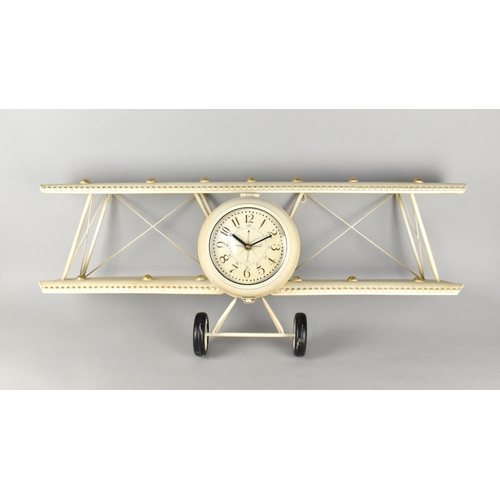 179 - A Large Novelty Wall Hanging Clock in the Form of The Front Section of a Vintage Bi-Plane, 89cms Wid... 