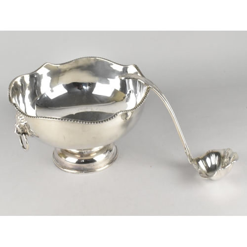 105 - A Mid 20th Century Silver Plated Punch Bowl with Lion Mask Ring Handles and a Kings Pattern Punch La... 