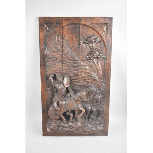 139 - A Carved Oak Panel Depicting Charioteer, Perhaps Boudica, 37x65cms