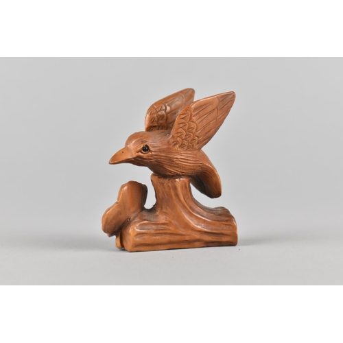 14 - A Carved Wooden Netsuke in the Form of a Hummingbird and Flower, Signed to Base, 4.5cms High