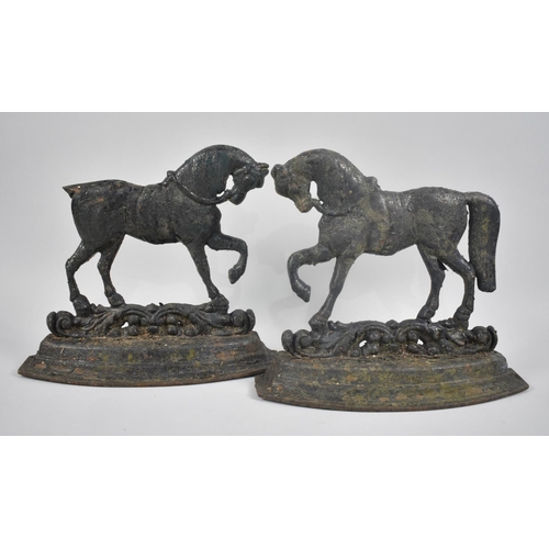 143 - A Pair of Vintage Cast Metal Doorstops/ Fireside Ornaments in the Form of Stallions, 29cms Wide