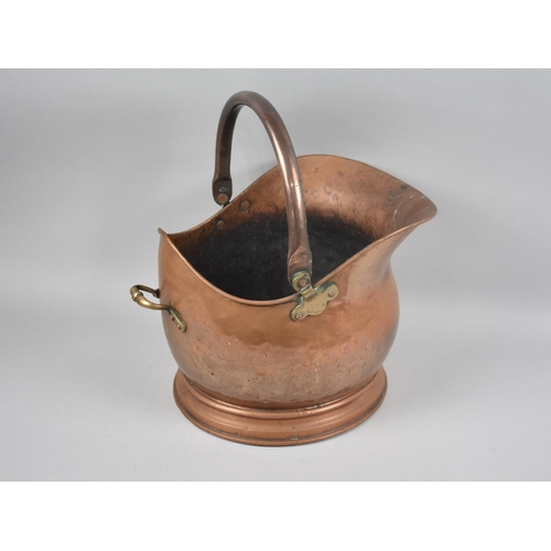 162 - A Large Copper Helmet Shaped Coal Scuttle