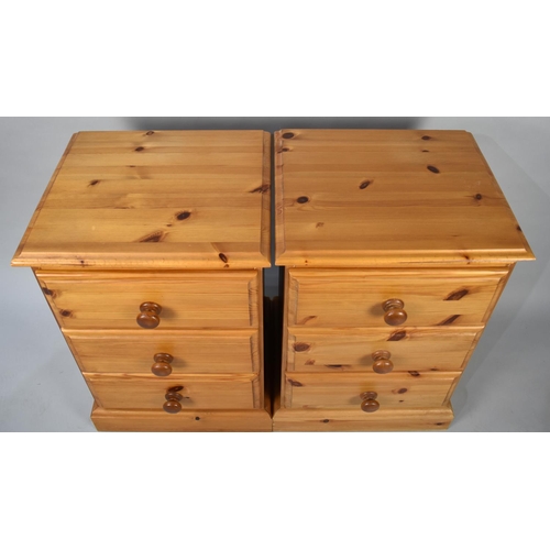 166 - A Pair of Modern Pine Three Drawer Bedside Chests, 46cms Wide