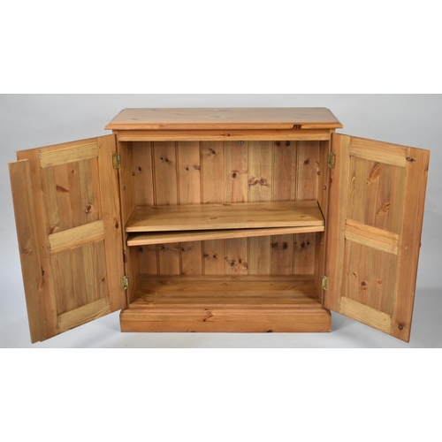 172 - A Modern Pine Side Cabinet with Panelled Doors, 76cms Wide