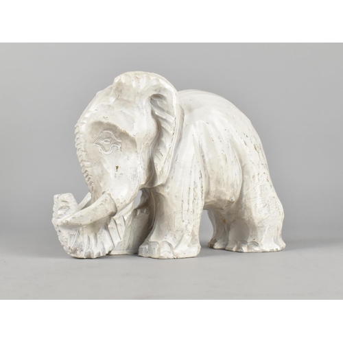 192 - A White Painted Carved Stone Study of an Elephant, 18cms Long