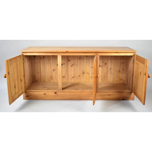 194 - A Modern Pine Side Cabinet with Three Panelled Doors, 144cms Wide and 65cms High