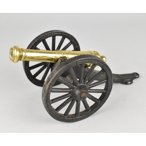 22 - A Brass and Iron Model of a Field Cannon, 20cms Long